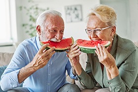 denture patients eating a watermelon