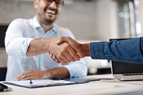 two people shaking hands
