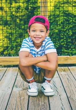 Young child smiling after children's dentistry visit