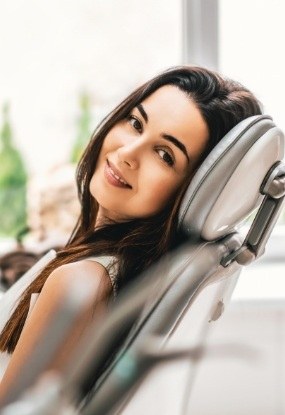 Woman relaxing in modern dental treatment room