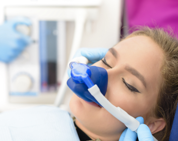 Relaxing patient under nitrous oxide dental sedation