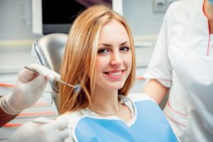 a young woman in the dentist chair