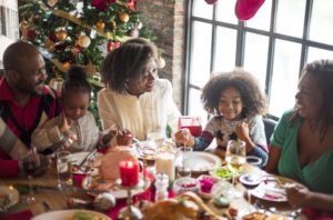 family having holiday dinner together