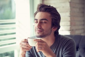 person drinking coffee 