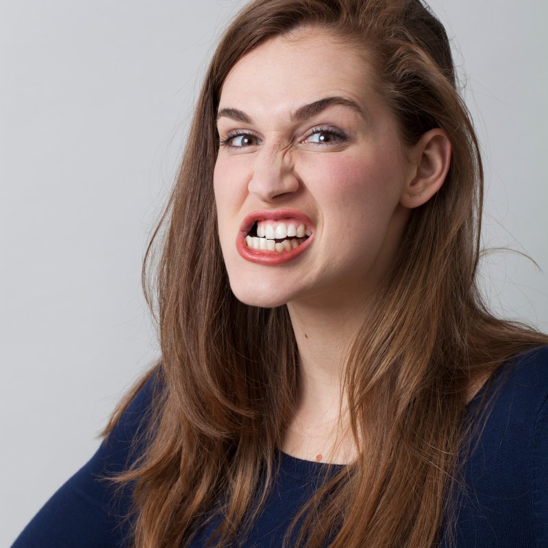 A woman who suffers from teeth grinding in Painesville