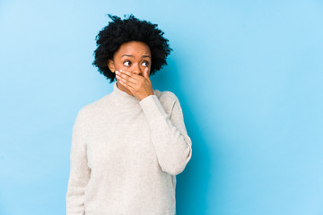 person with oral health problems covering mouth